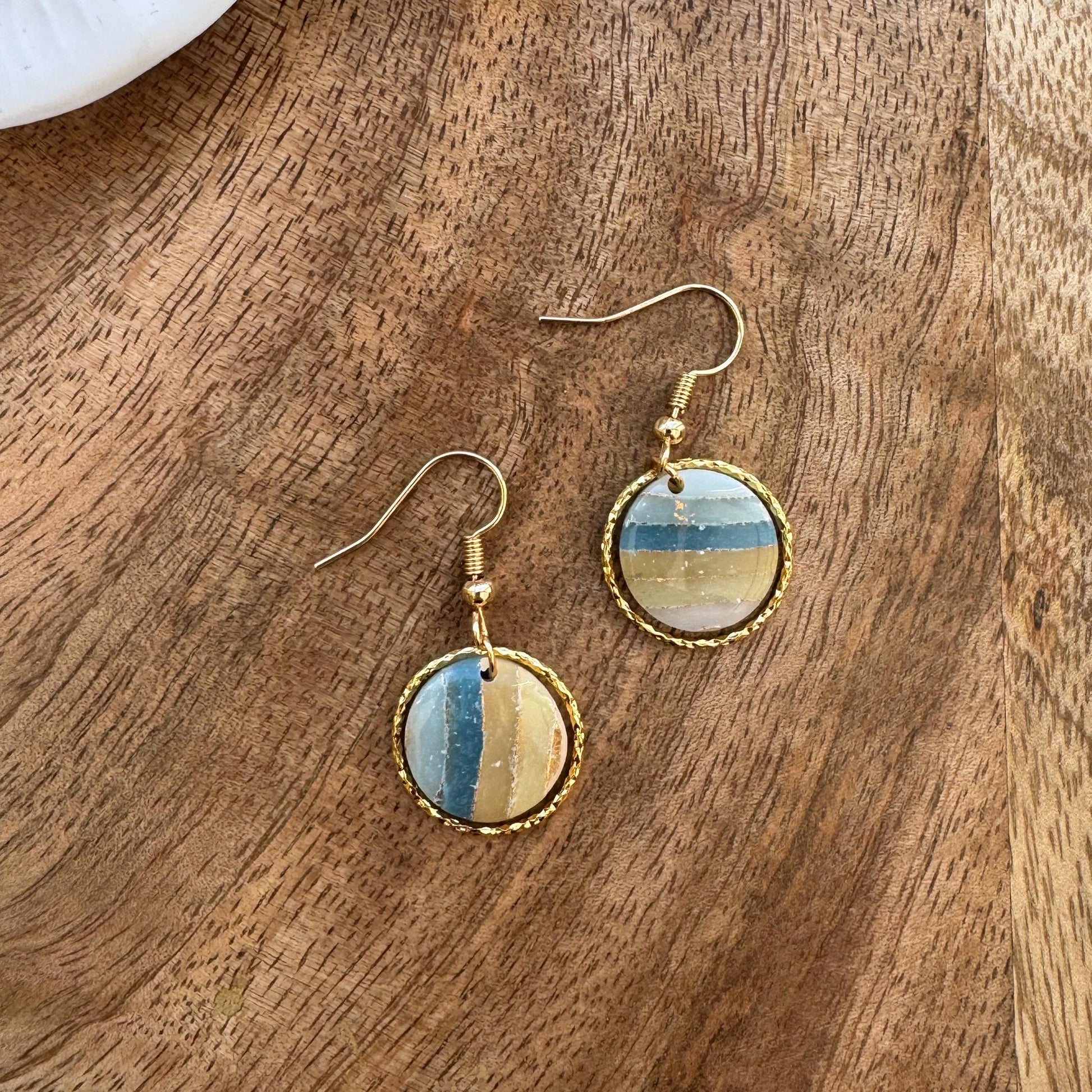 Diva & Dough neutral-toned marbled polymer clay earrings with a high-gloss resin finish, inspired by coastal sand and waves.