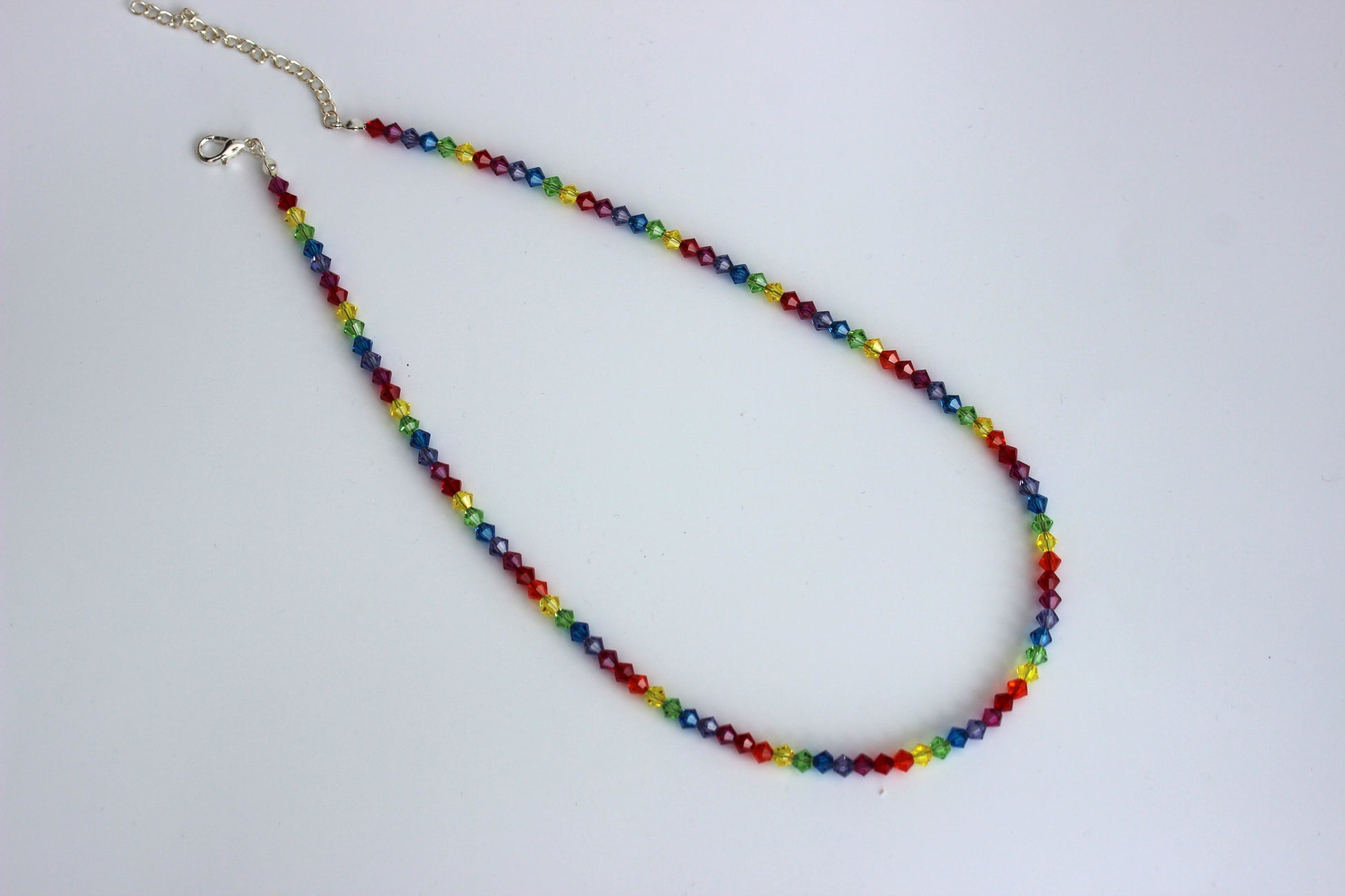 Multicolored beaded necklace on a white background