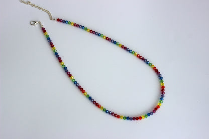 Multicolored beaded necklace on a white background